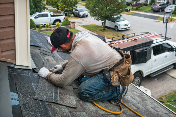 Professional Gutter Installation technician working in Lakewood, NJ